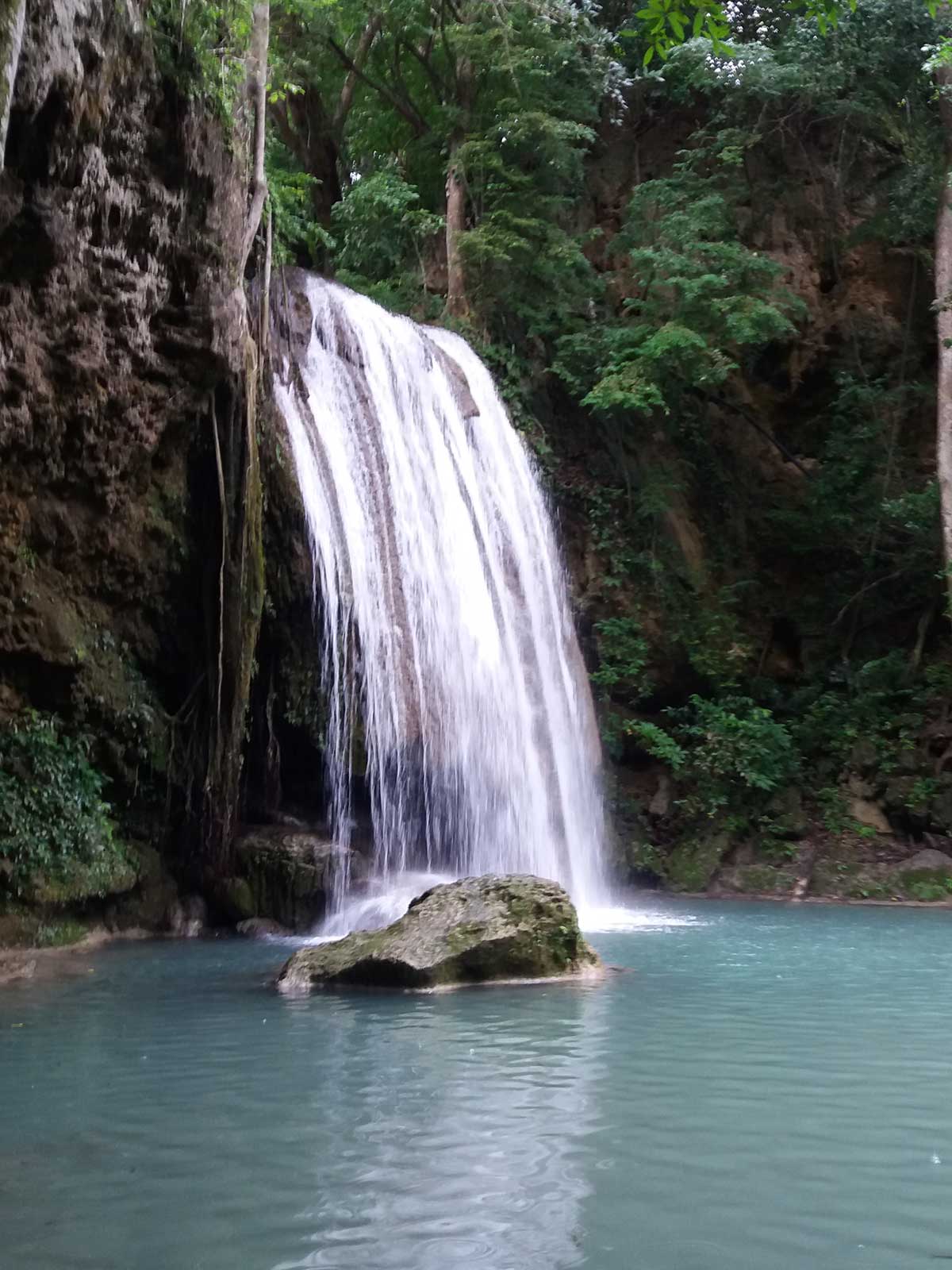 Discover Erawan Waterfalls.